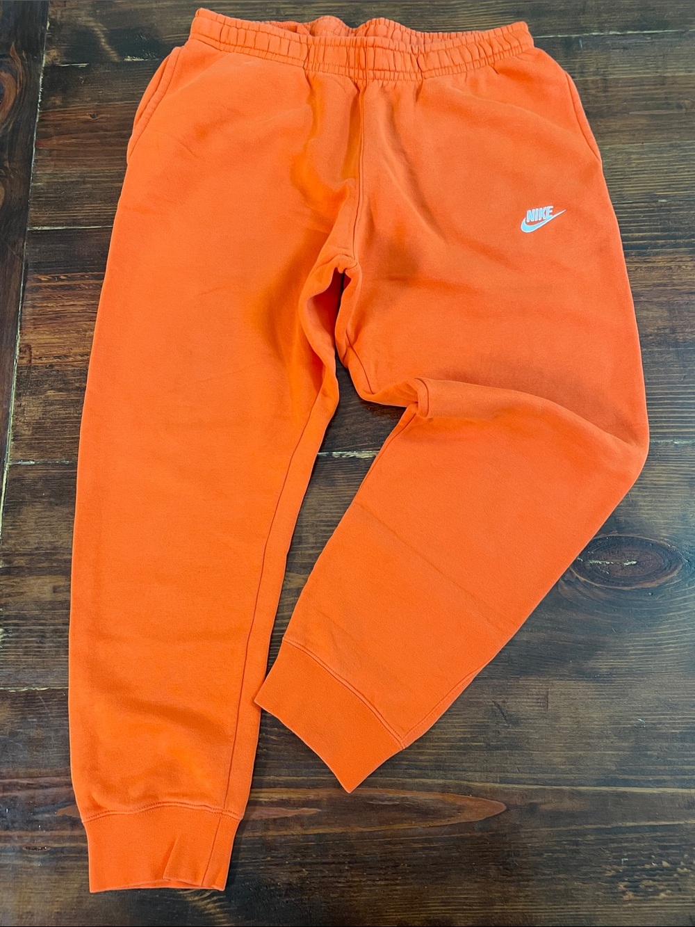 Nike Orange Fleece Joggers with White Swoosh